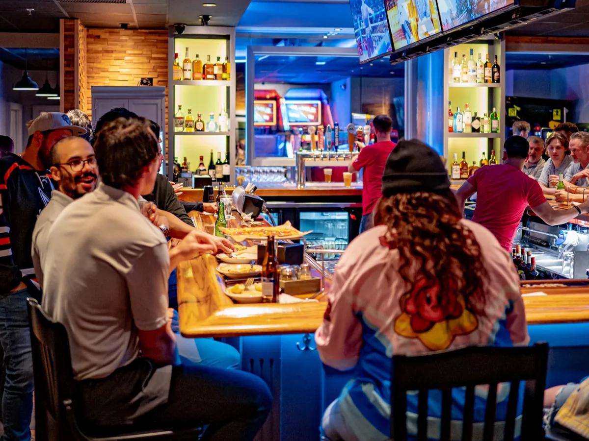 Guests at the bar at Vans Craft Kitchen in Danbury