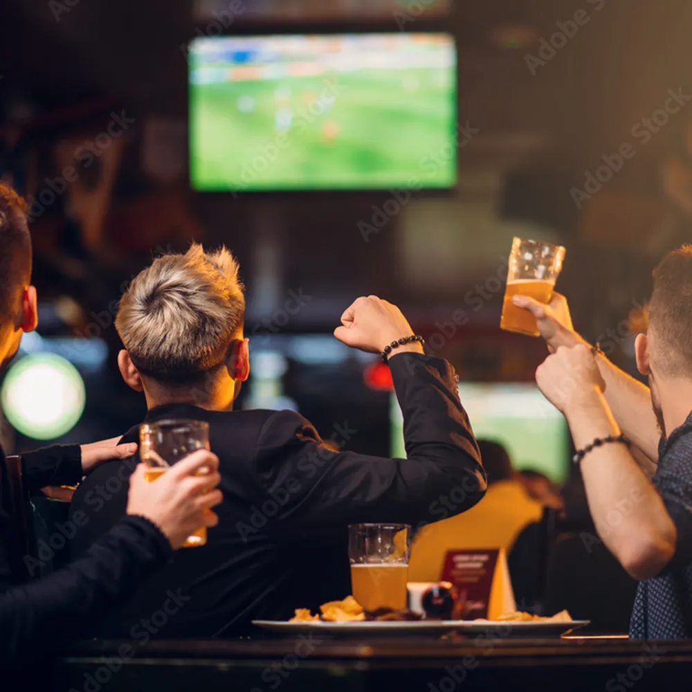 Sports bar seating and televisions at Vans Craft Kitchen in Danbury